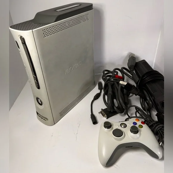 Microsoft Xbox Console with Controller and cords. 60GB. Some staining. Tested